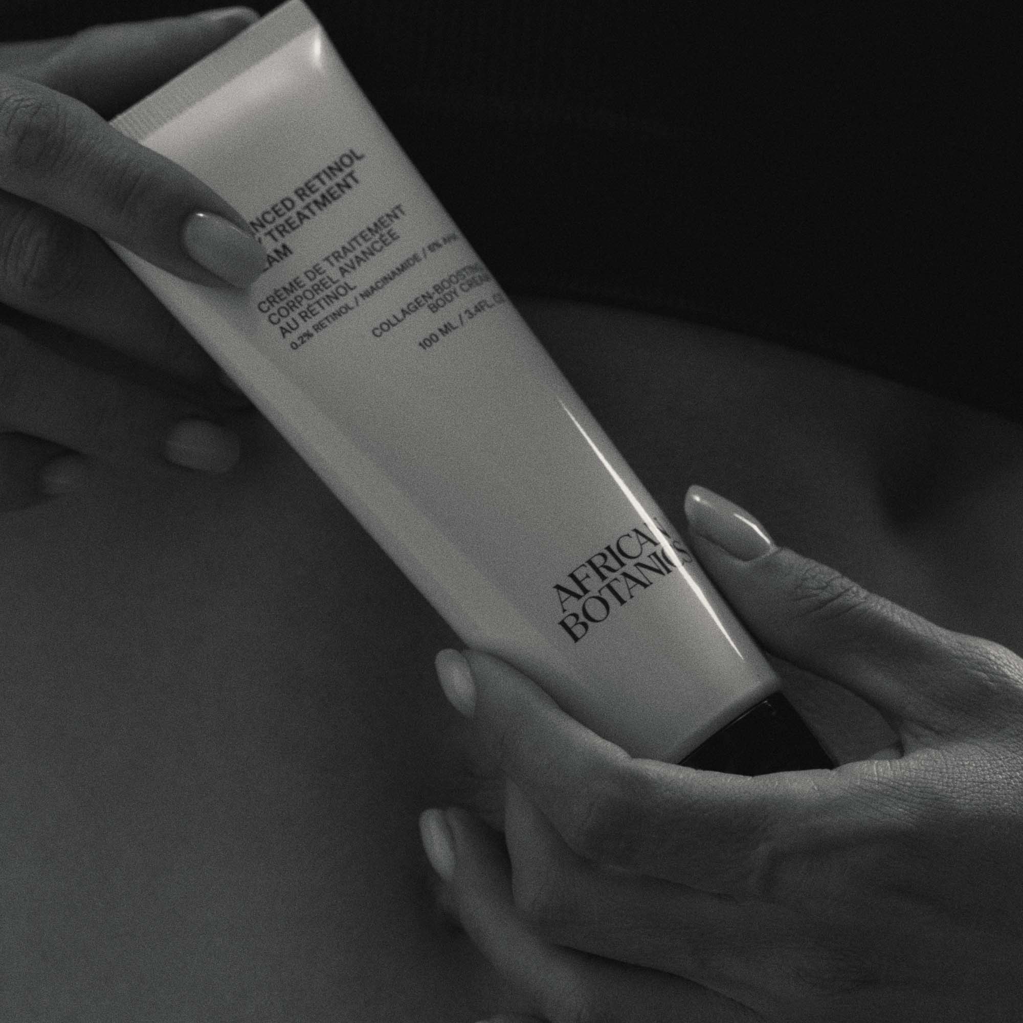 applying retinol body cream to improve skin texture and firmness on arms and legs