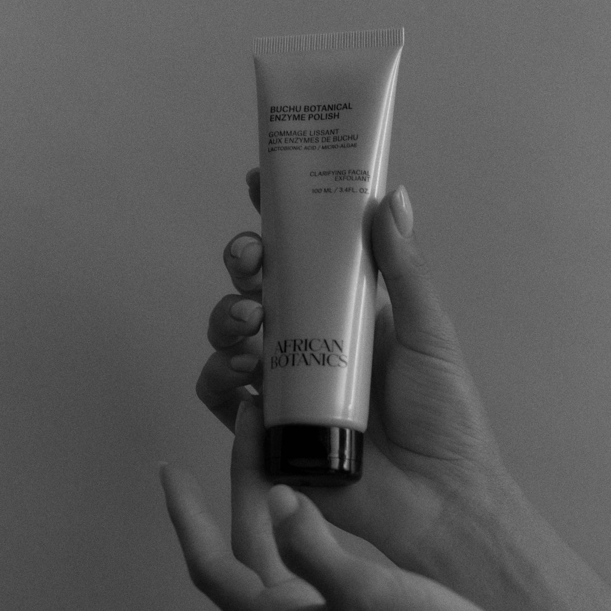African Botanics Buchu Botanical Enzyme Polish applied to skin — gentle yet effective facial scrub suitable for sensitive, oily, and blemish-prone skin