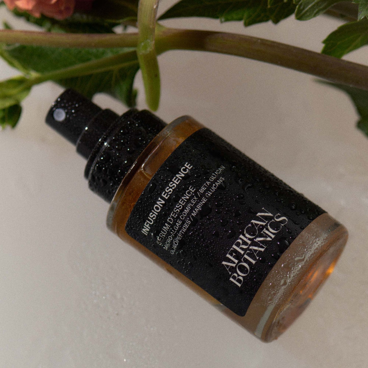 African Botanics Infusion Essence — alcohol-free hydrating mist suitable for all skin types, use as prep, makeup setter, or midday skin refresher.