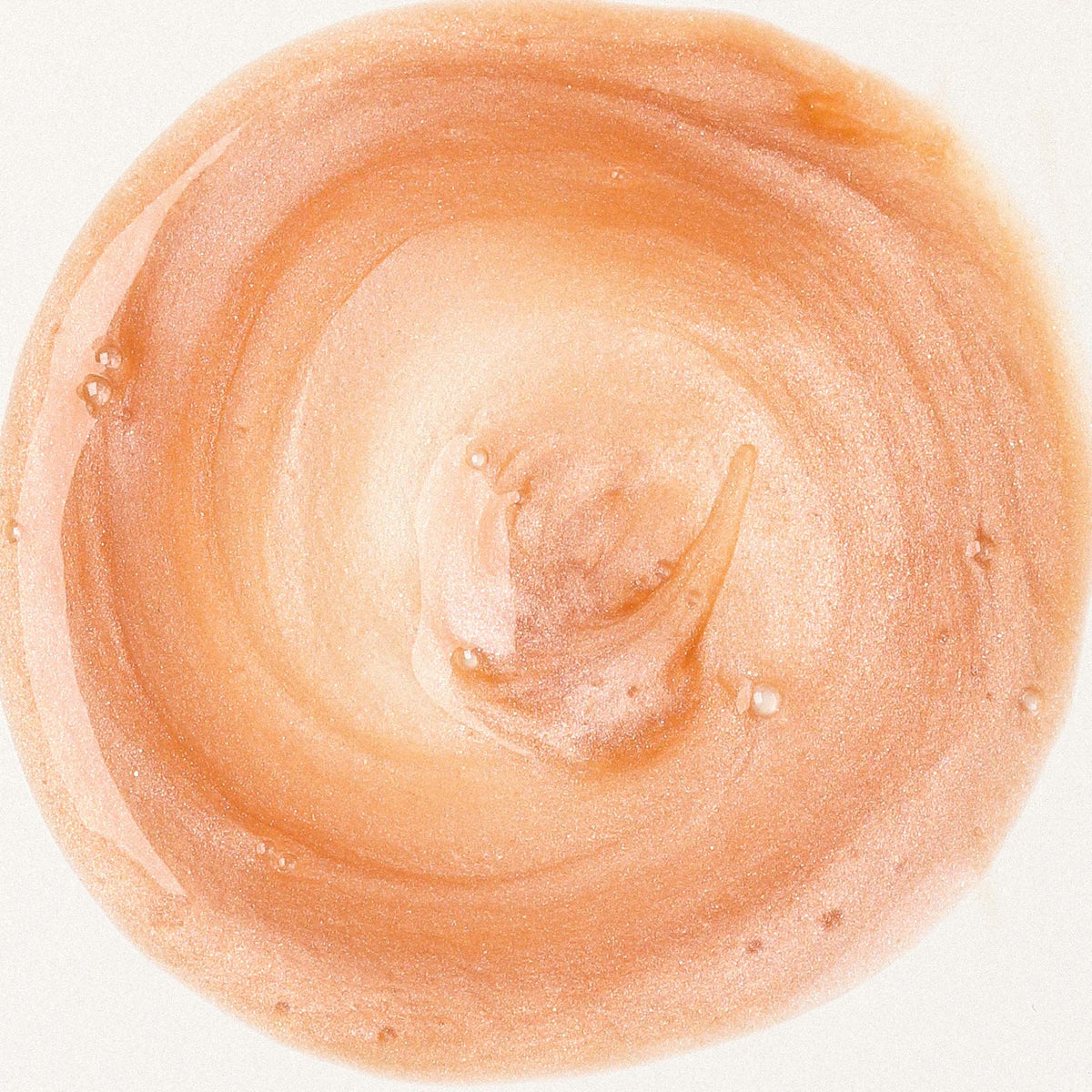 African Botanics Lucent Pearl Booster texture — luminous iridescent shimmer from Mother of Pearl Extract for a soft-focus radiant finish on all skin types