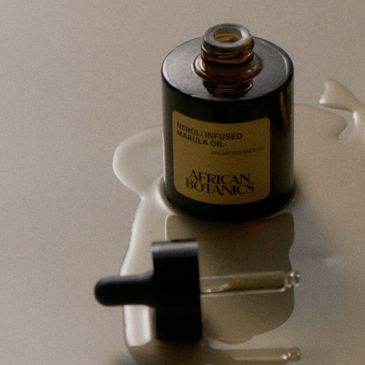 African Botanics Neroli Infused Marula Oil applied to refine pores and brighten skin