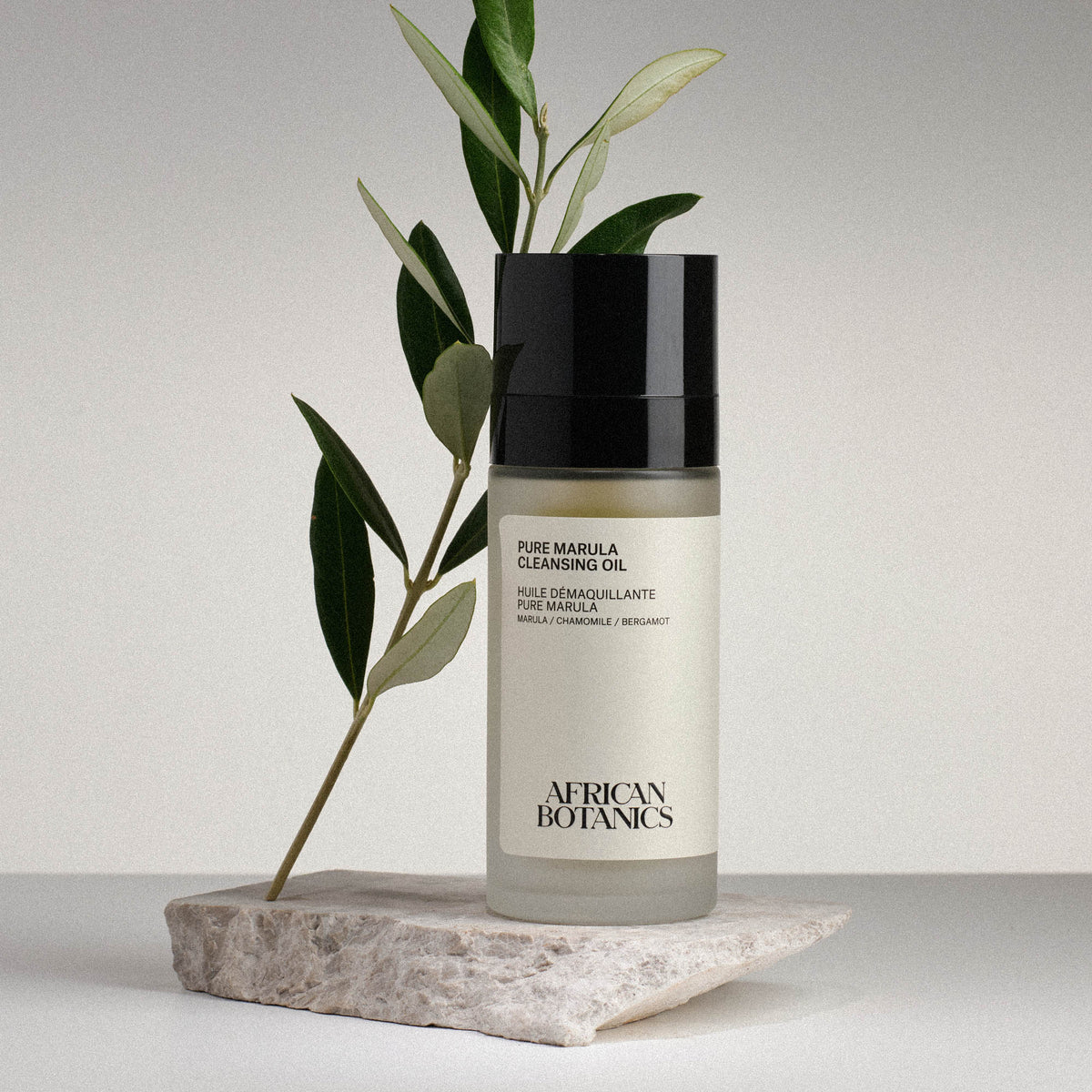 African Botanics Pure Marula Cleansing Oil texture — emulsifying cleansing oil with Blue Chamomile, Lavender, and Frankincense for sensitive and blemish-prone skin