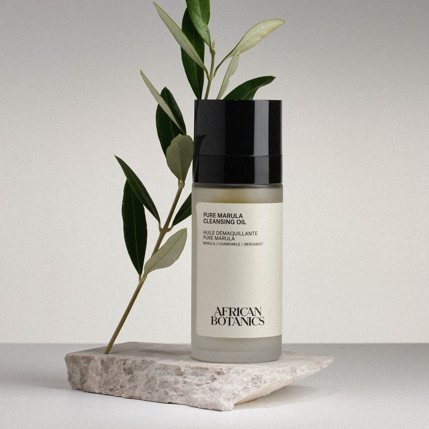 African Botanics Pure Marula Cleansing Oil texture — emulsifying cleansing oil with Blue Chamomile, Lavender, and Frankincense for sensitive and blemish-prone skin