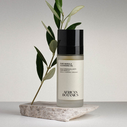 African Botanics Pure Marula Cleansing Oil texture — emulsifying cleansing oil with Blue Chamomile, Lavender, and Frankincense for sensitive and blemish-prone skin