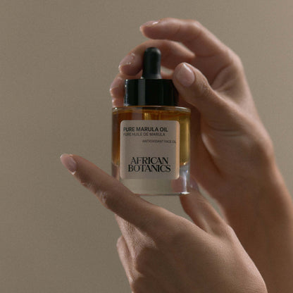 African Botanics Pure Marula Oil application — non-comedogenic luxury face oil for sensitive, dry, and mature skin types