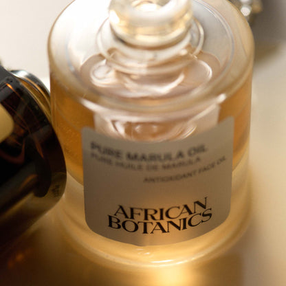 African Botanics Pure Marula Oil texture — fast-absorbing antioxidant-rich face oil with 70-78% Oleic Acid for luminous replenished skin